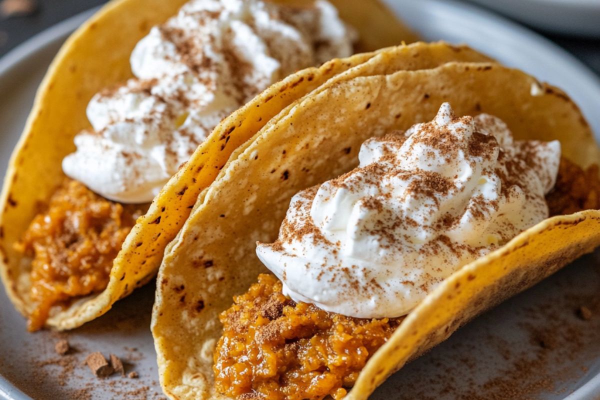 Pumpkin Pie Tacos topped with whipped cream and cinnamon